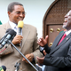 Former Tanzanian president Jakaya Kikwete laughs with his successor, John Magfuli, in 2015.
